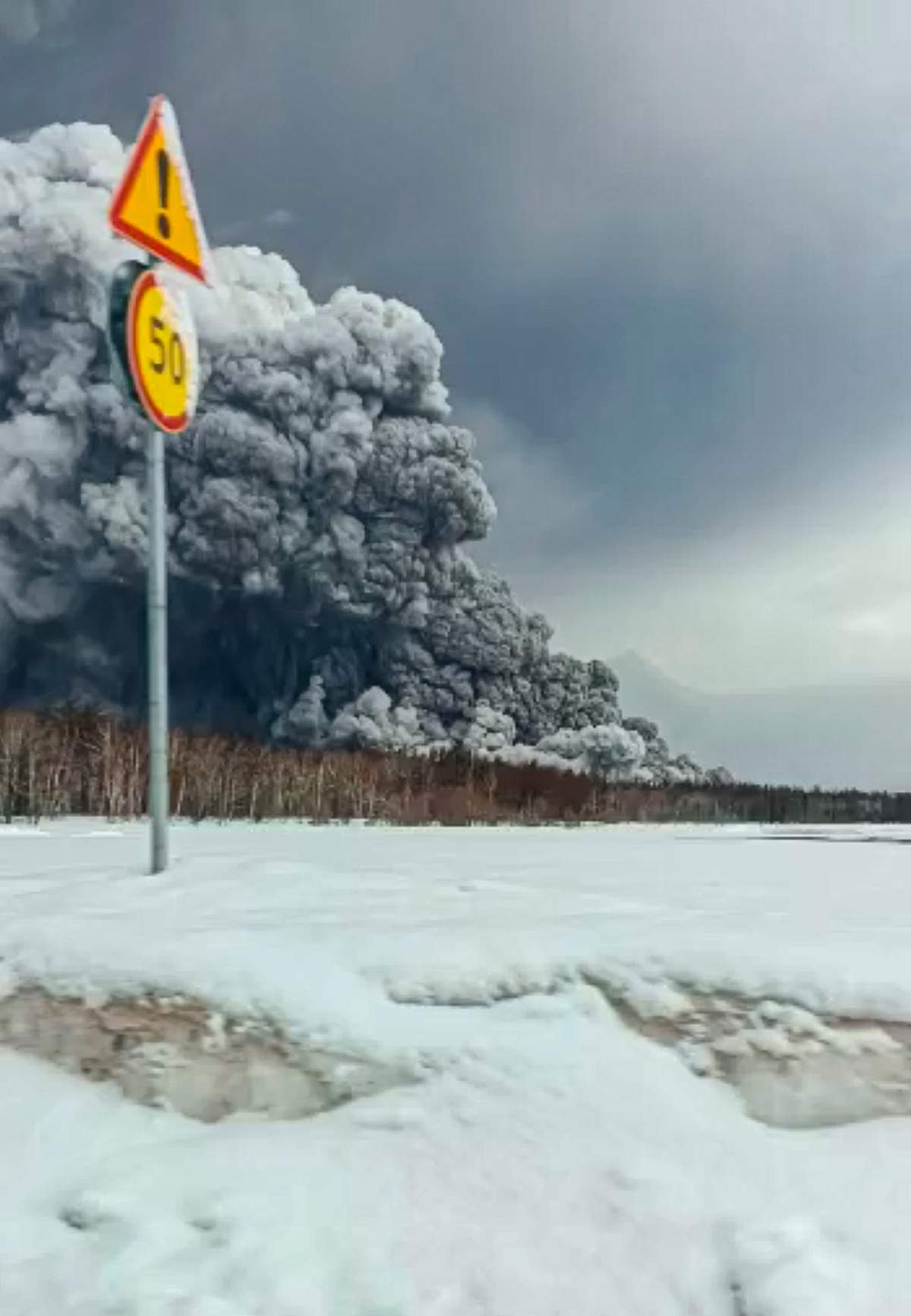 Smoke and ash are visible during the the Shiveluch volcano's eruption on the Kamchatka Peninsula in Russia, Tuesday, April 11, 2023.
