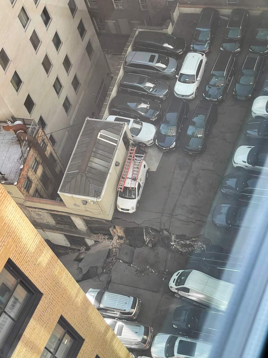 This photo provided by Charlie Franklin shows a partially collapsed parking garage in lower Manhattan’s Financial District on Tuesday, April 18, 2023, in New York City. Officials didn’t immediately release any information on injuries. (Charlie Franklin via AP)