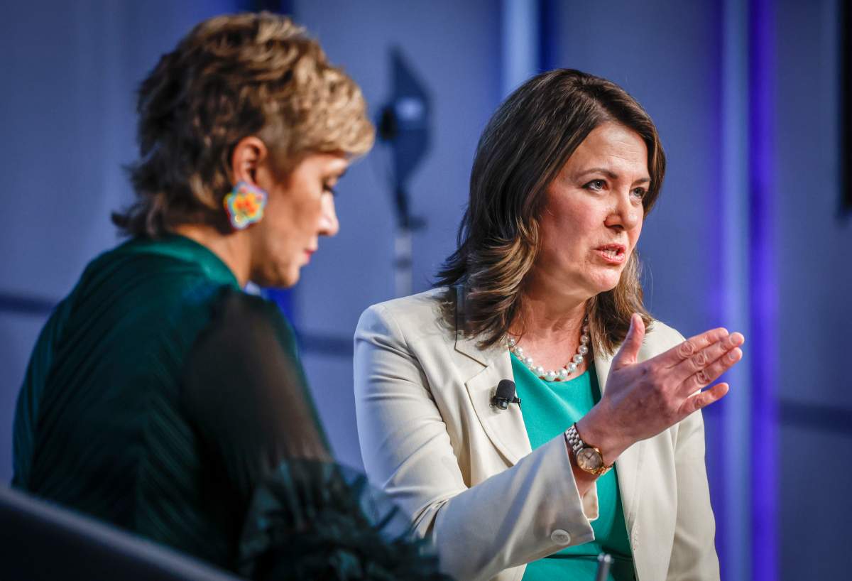 Calgary Mayor Jyoti Gondek, left, interviews Alberta Premier Danielle Smith at an economic forum in Calgary, Alta., Tuesday, April 18, 2023.