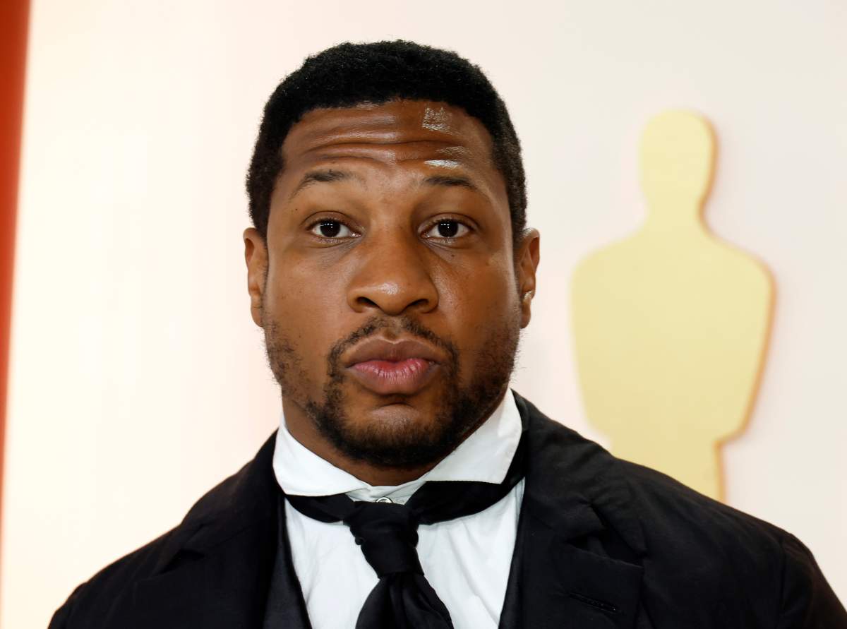 Jonathan Majors on a red carpet.