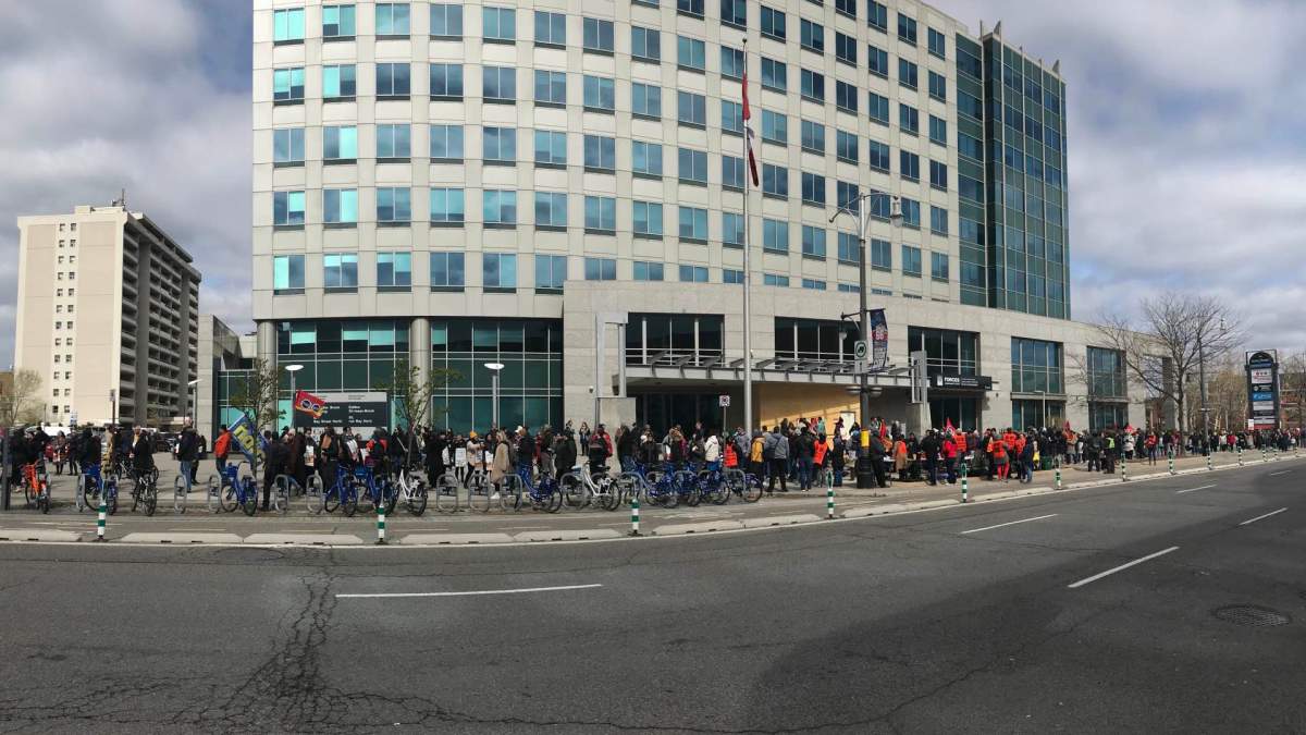 Hundreds of public servants flooded the street in front of the federal building in downtown Hamilton on April 19, 2023 joining tens of thousands across the Canada striking in a job action focused on pay and remote work.