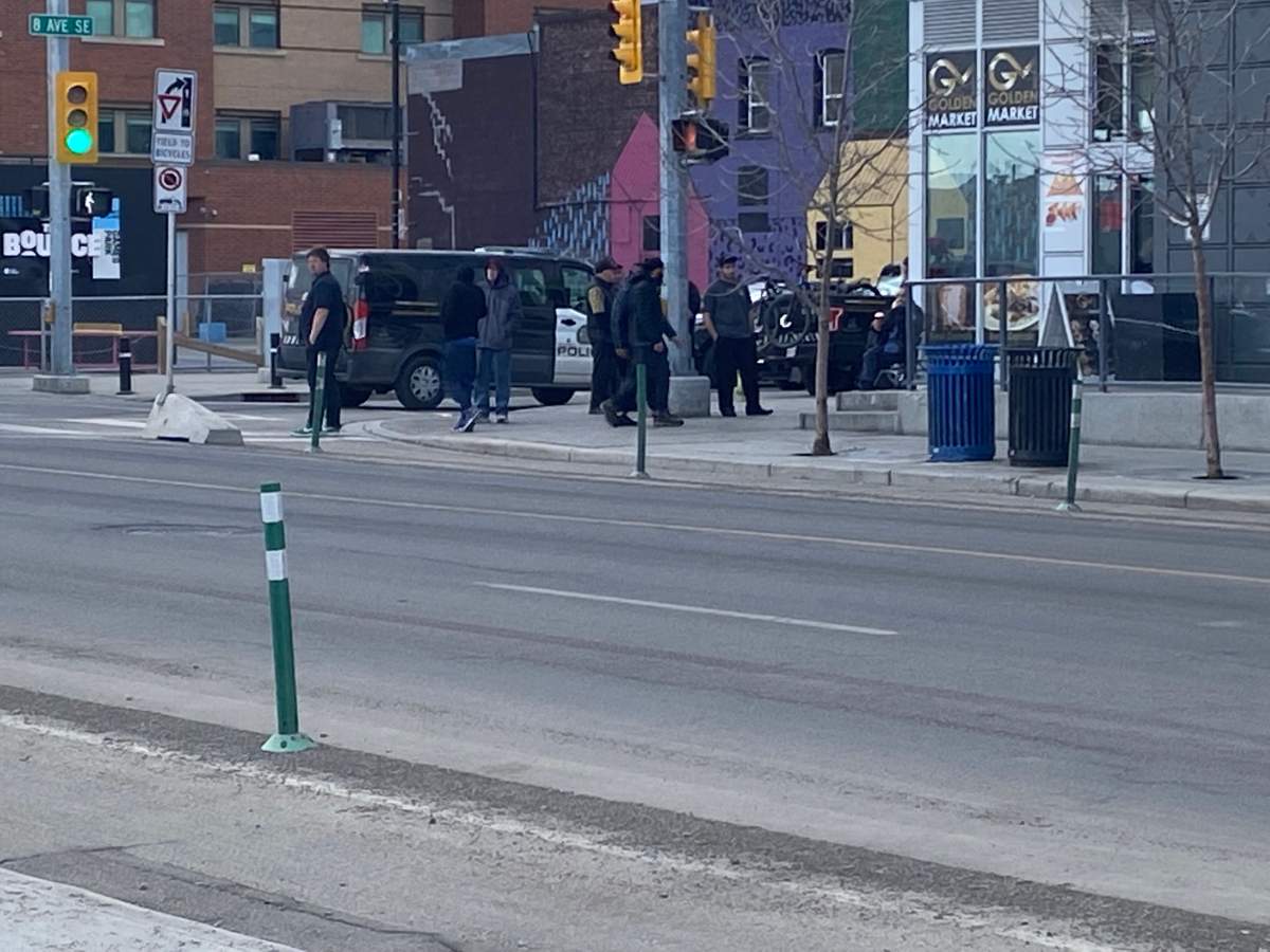 Police officers have sealed off a downtown Calgary Tim Horton's due to an ongoing incident on Wednesday, April 12, 2023.