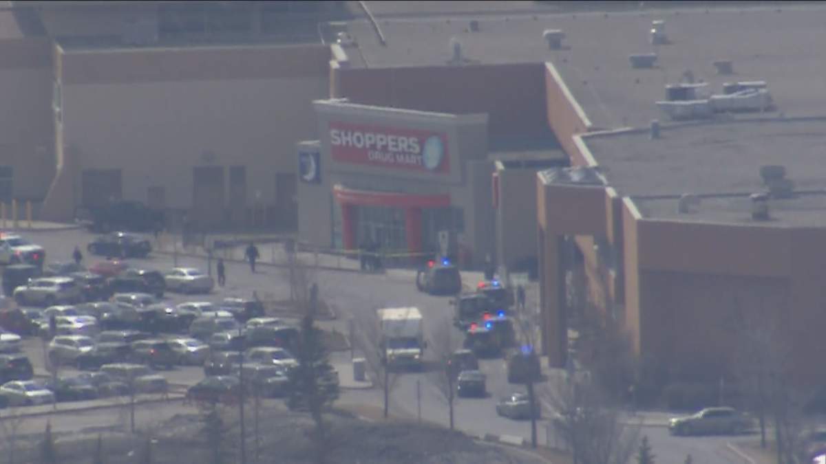 A large police presence outside Sunridge Mall in northeast Calgary on Friday, April 14, 2023.