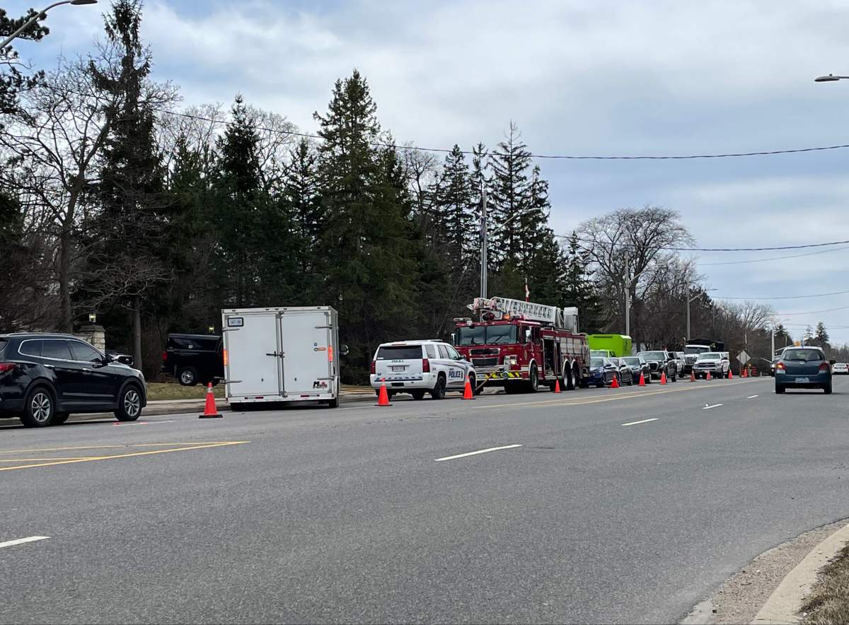 Police, fire and other vehicles are seen stationed.