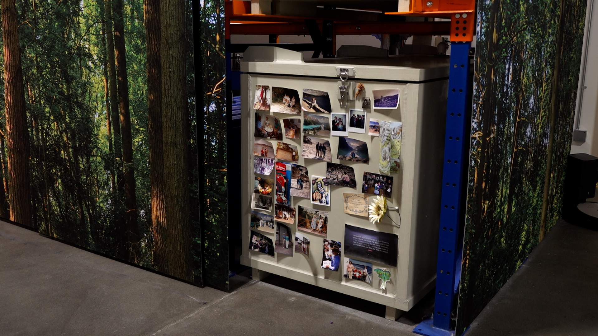 Pictures and mementos adorn a vessel for human composting at Return Home