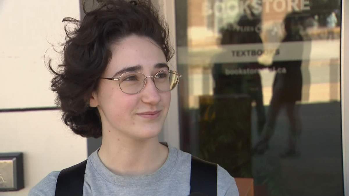 Rae Nicolas says she works two part-time jobs to get by.