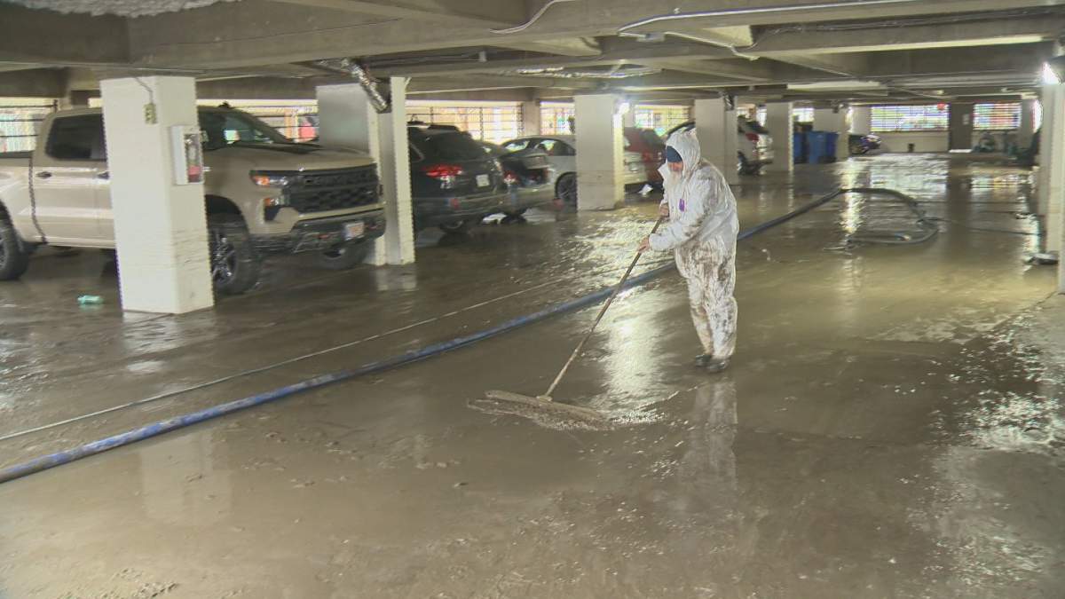 Water rushed into the parkade and lobby of a 32-unit apartment building near Highway 97 and Pandosy Street Thursday morning after a the break occurred..  .