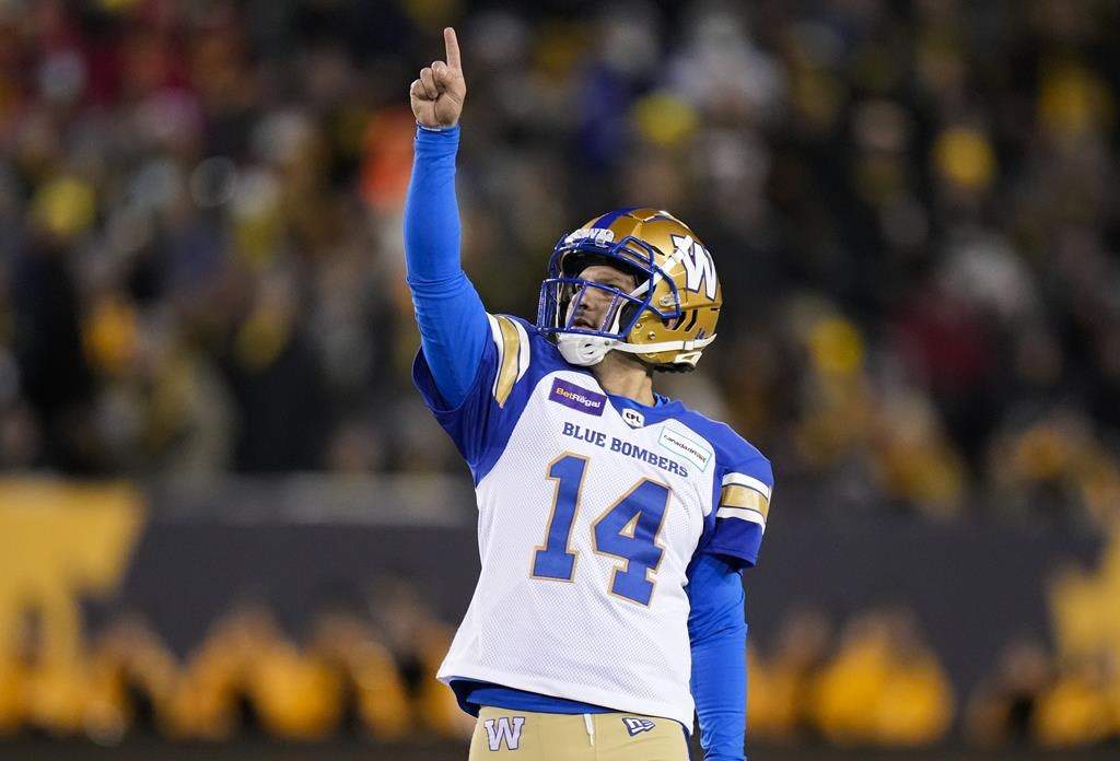 Winnipeg Blue Bombers kicker Sergio Castillo (14) celebrates a field goal against the Hamilton Tiger-Cats during second-half football action in the 108th CFL Grey Cup in Hamilton, Ont., on December 12, 2021.