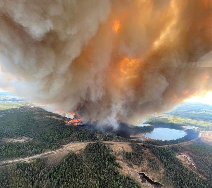 Smoke from an out-of-control fire in Yellowhead County near Elk River is shown in this May 4, 2023 handout photo. Alberta Wildfire