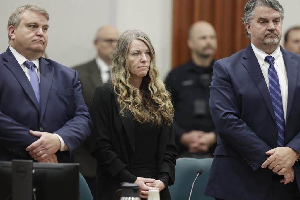 Lori Vallow Daybell stands and listens as the jury's verdict is read at the Ada County Courthouse in Boise, Idaho on Friday May 12, 2023. The Idaho jury convicted Daybell of murder in the deaths of her two youngest children and a romantic rival, a verdict that marks the end of a three-year investigation that included bizarre claims of zombie children, apocalyptic prophesies and illicit affairs.