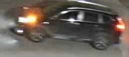 Police want to identify two suspects seen driving a dark-coloured SUV.