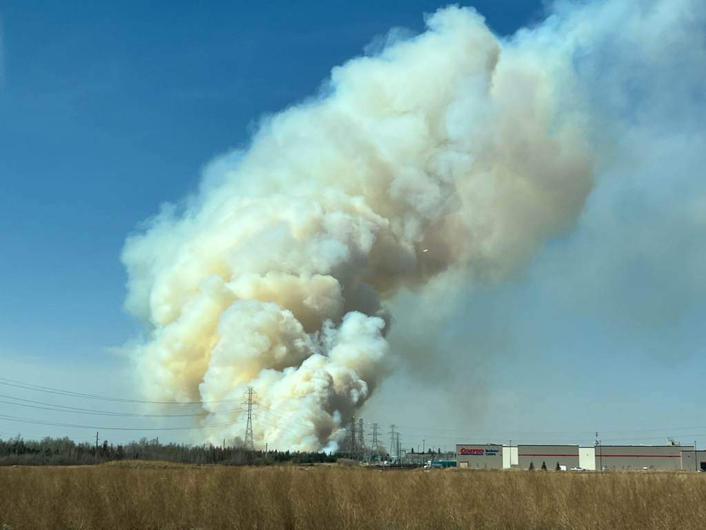A grass fire near Anthony Henday Drive in west Edmonton on Monday, May 1, 2023.