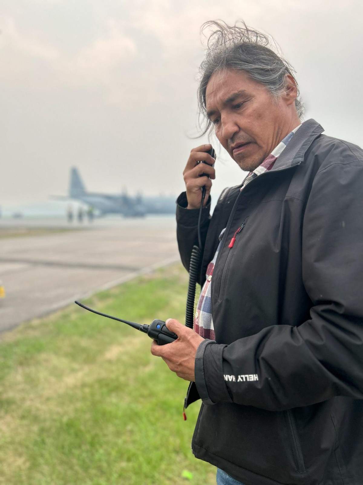 Athabasca Chipewyan First Nation Chief Allan Adam helping coordinate the evacuation order in Fort Chipewyan, Alta. on Tuesday, May 30, 2023.