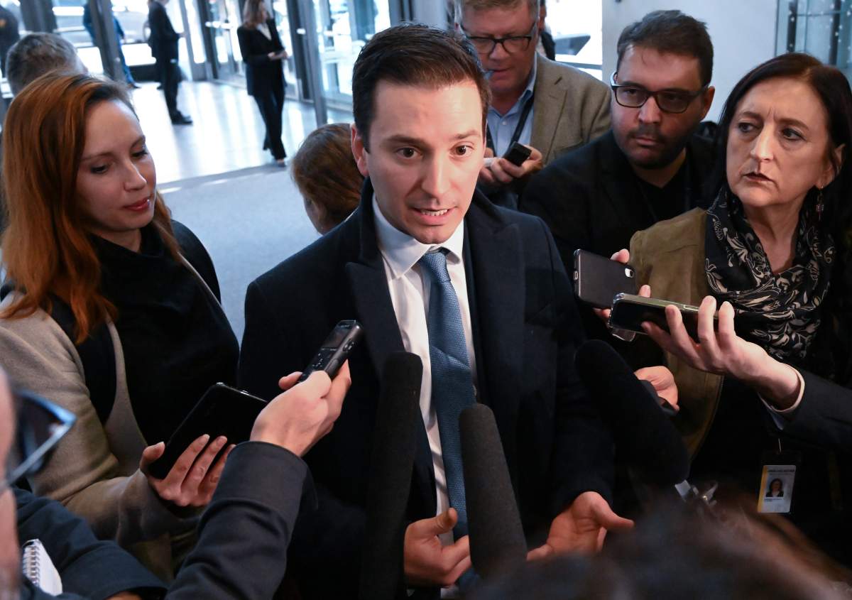 Quebec Government House Leader and Justice Minister Simon Jolin-Barrette speaks to reporters before entering a government caucus meeting, Tuesday, November 15, 2022 in Quebec City.