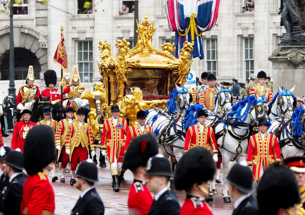 The carriage carrying King Charles lll and Queen Camilla proceeds during the Royal Procession following the King’s Coronation, in London on Saturday, May 6, 2023. THE CANADIAN PRESS/Nathan Denette
