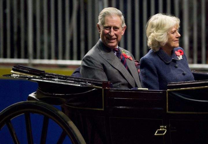 In this Nov. 6, 2009 photo, Prince Charles, left, and Camilla, Duchess of Cornwall, arrive at the Royal Agricultural Winter Fair in Toronto.
