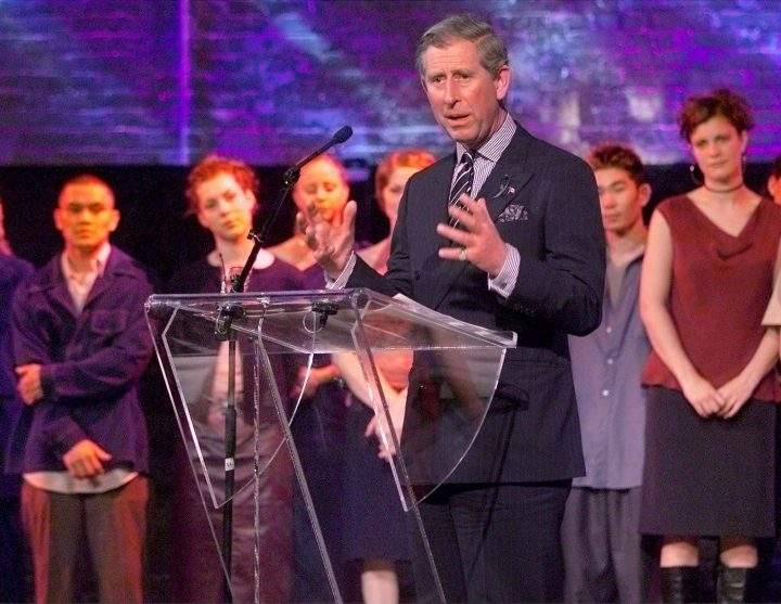 Prince Charles speaks after a cultural and artistic performance by young Canadians at the Gooderham and Worts Historical Site in Toronto on Monday, April 30, 2001. The prince hosted a private dinner party at a historical distillery near the Toronto waterfront to celebrate young Canadian performing and visual artists.