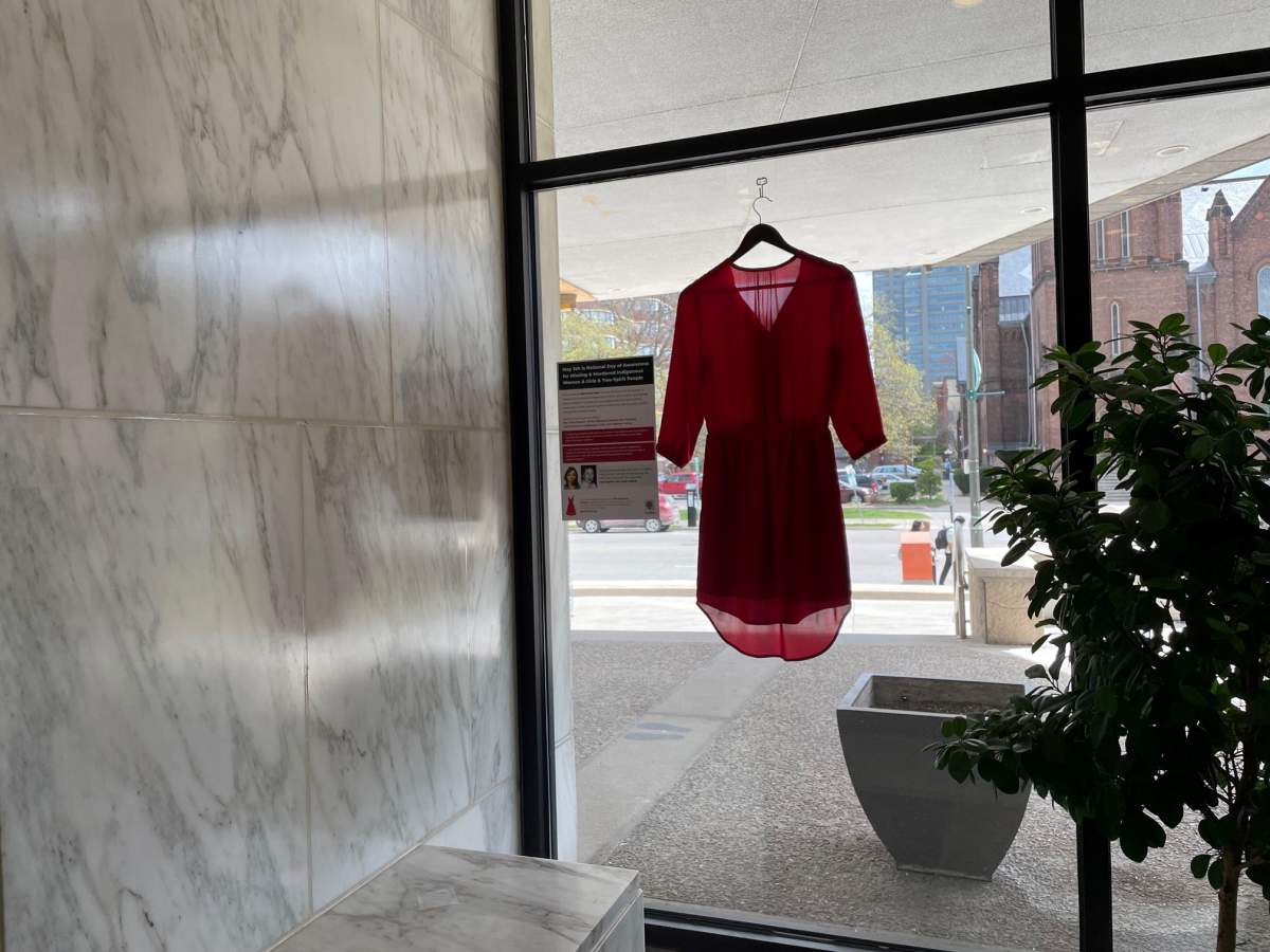 One of two red dresses hung up at city hall on May 5, 2023 for Sonya Cywink, an Indigenous woman that was killed in 1994 in London.