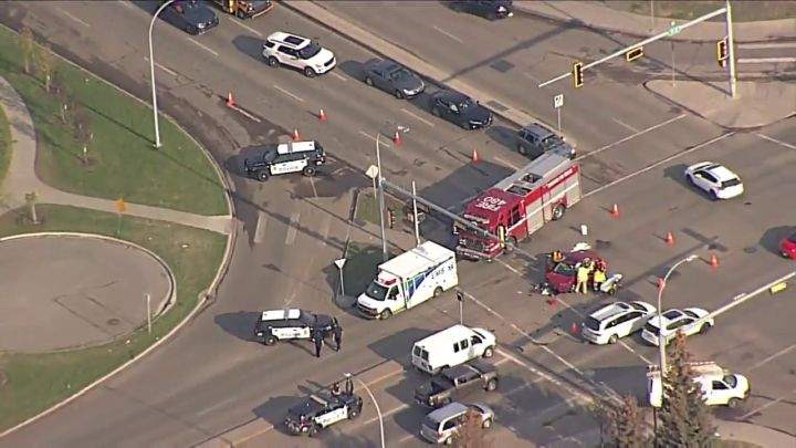 Emergency crews in Edmonton respond to a crash in the area of 75 Street and 82 Avenue on Thursday morning.