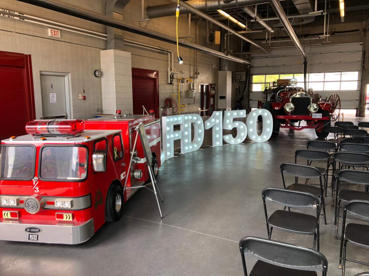 The event featured fire department officials, local politicians, and historic artifacts and photographs from the department's 150 years of service.
