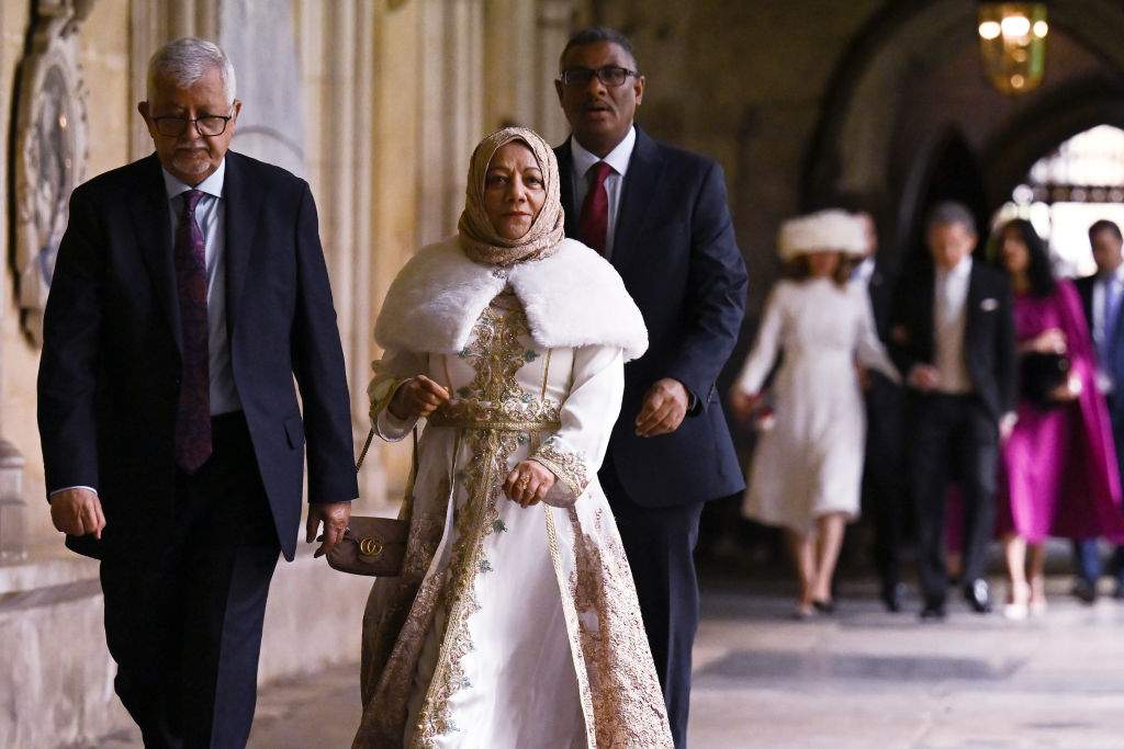 Yang di Pertuan Agong and Raja Permaisuri Agong of Malaysia arrive to take their seats ahead of the Coronation of King Charles III and Queen Camilla on May 6, 2023 in London, England.