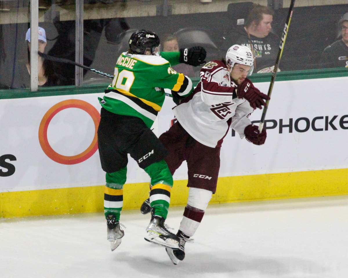 Max McCue of the London Knights lays a big hit in Game 1 of the OHL Championship series.
