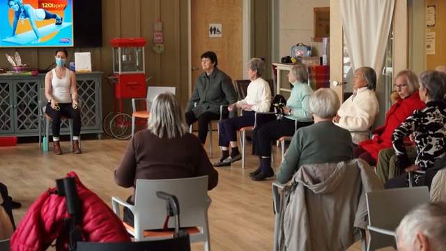Villagers taking part in a fitness class in the community centre