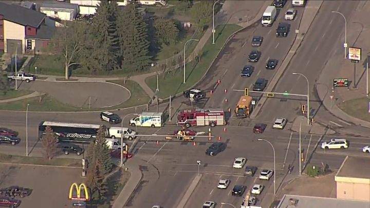 Emergency crews in Edmonton respond to a crash in the area of 75 Street and 82 Avenue on Thursday morning.
