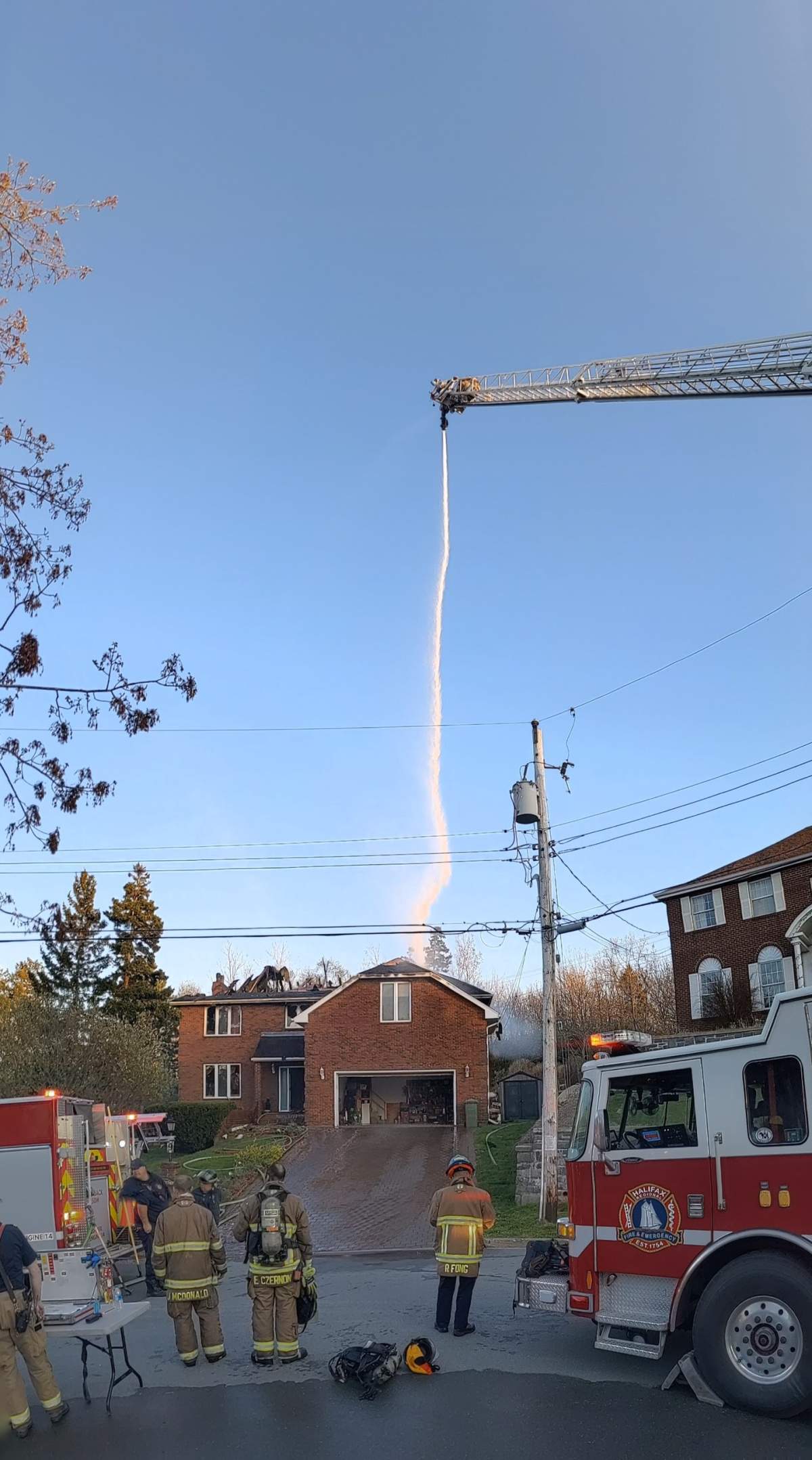 Fire officials say the home is extensively damaged, and the roof caved in shortly after crews were pulled out.