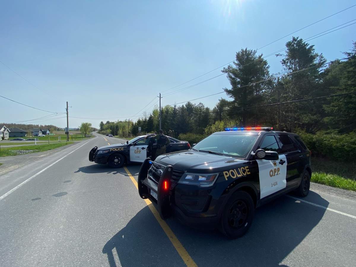 Police on scene in Bourget, Ont., a small community just west of Ottawa, where three OPP officers were shot on May 11, 2023.