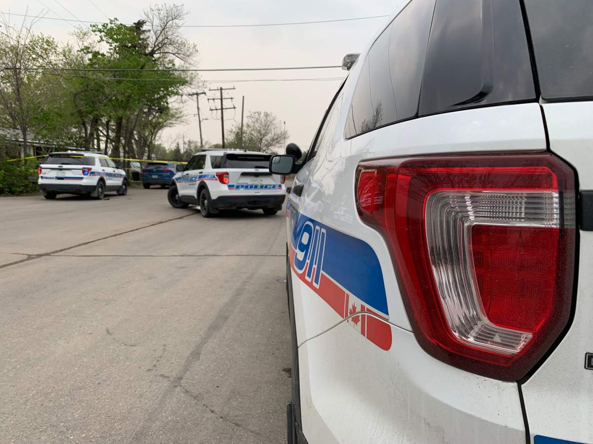Police can be seen at the Glen Elm Trailer Court on Saturday, May 20 after an adult was found dead.