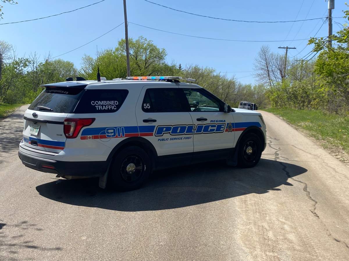 A Regina police car in the Village of Buena Vista Friday afternoon as police and RCMP undergo a joint operation. 