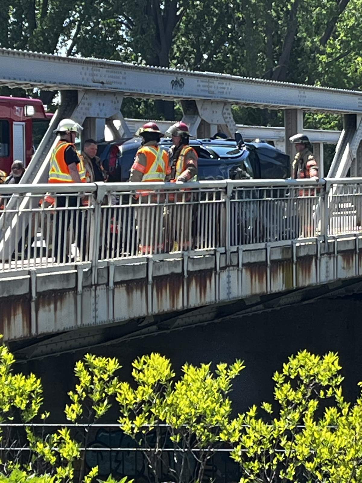A vehicle was flipped onto its side along Kensington Bridge on May 26, 2023.