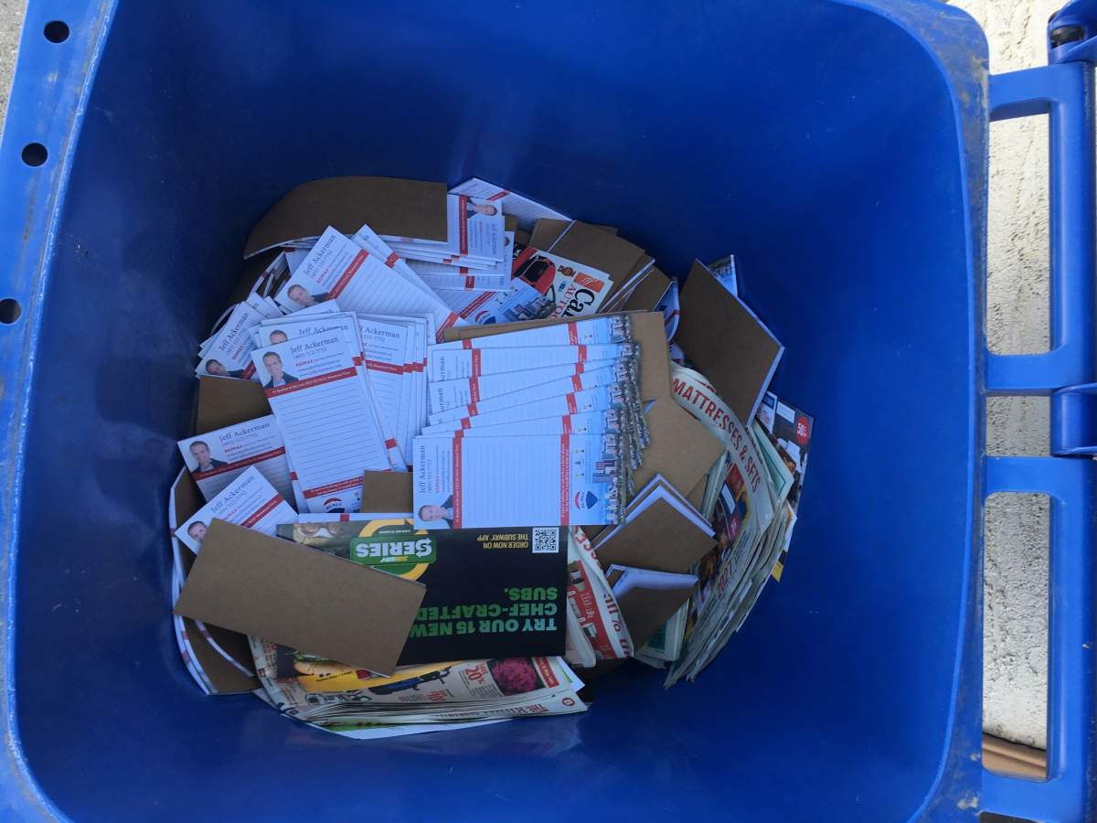 Calgary realtor complains after marketing materials are dumped in recycling bin