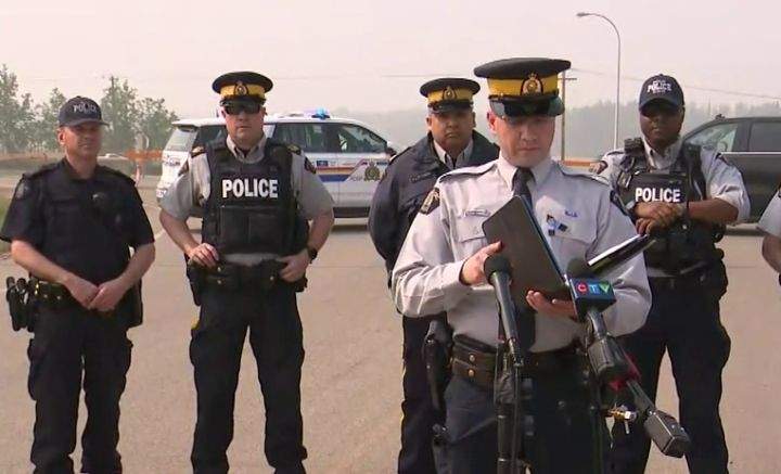 RCMP speak at a news conference in Valleyview, Alta., on May 17, 2023.