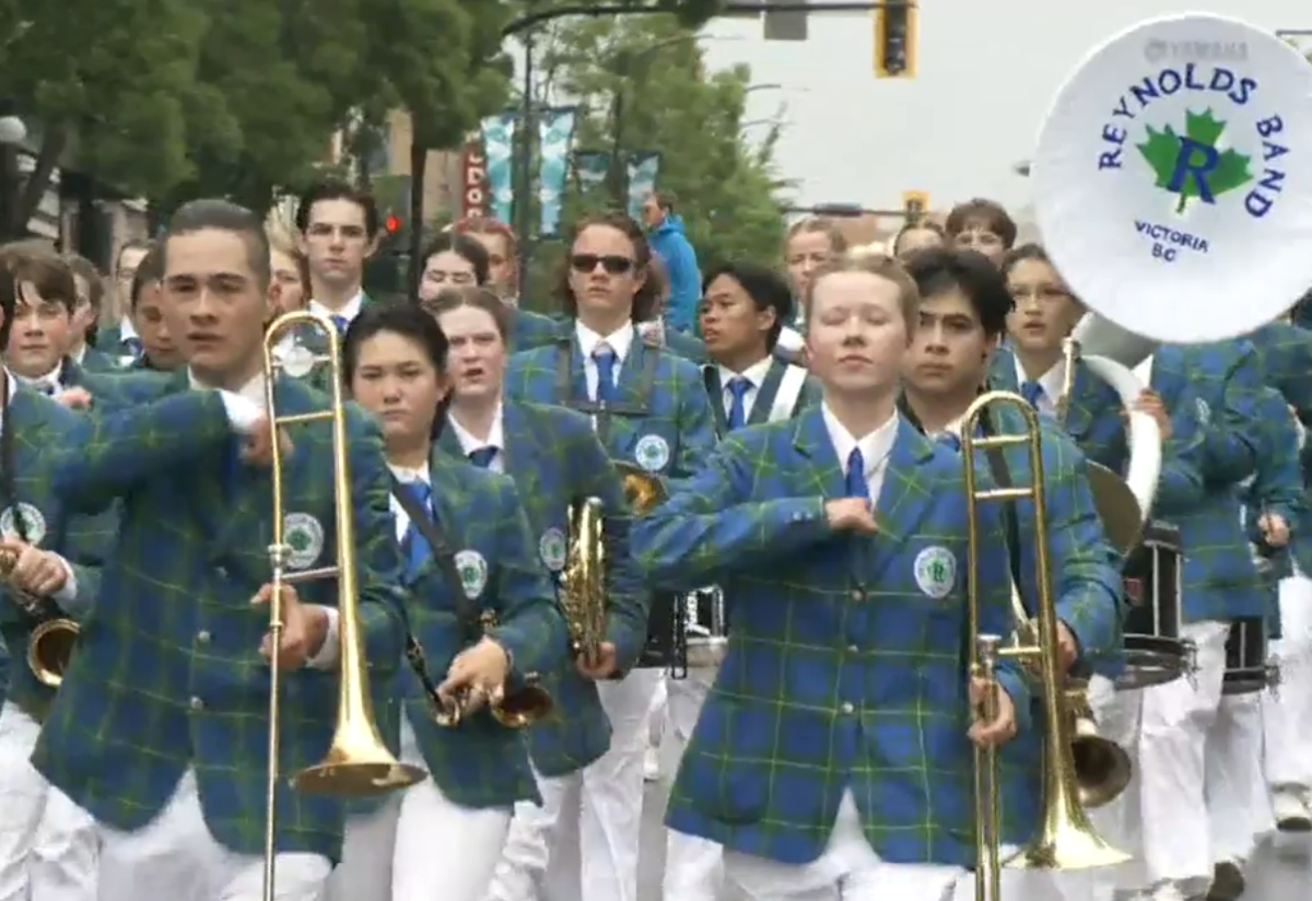 Members of the Reynolds Secondary Band of Victoria march in the Victoria Day parade May 22, 2023.