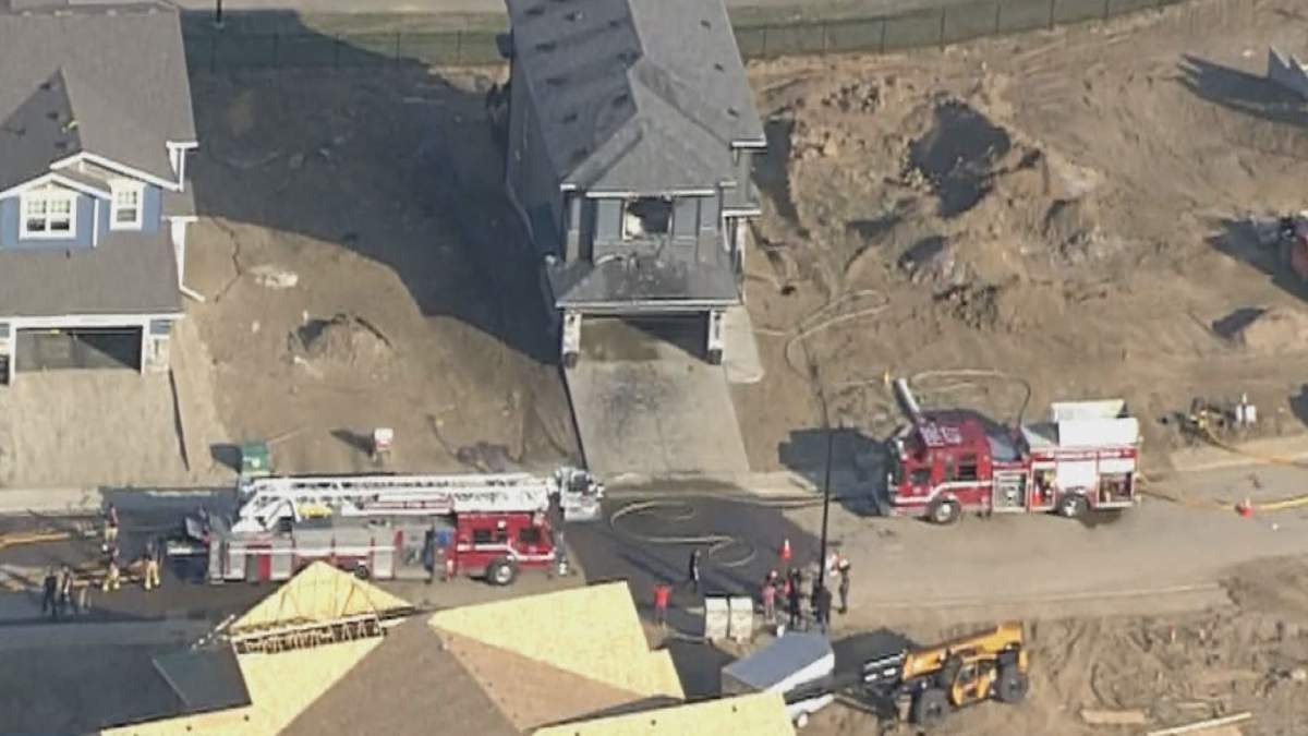 House fire in south Edmonton at 81 Avenue and 221 Street on Sunday, May 14, 2023.