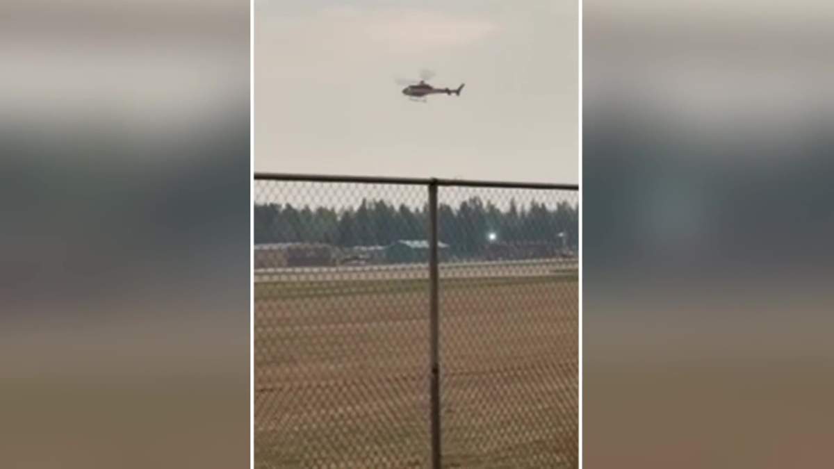 A helicopter coming into land before crashing at the Edson Airport west of Edmonton, Alta. on Thursday, May 4, 2023.