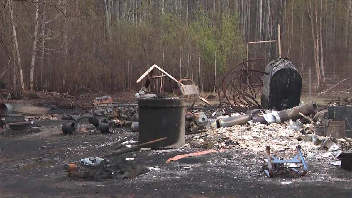 The remains of a house destroyed by wildfire in East Prairie Metis Settlement, Alta. on Friday, May 5, 2023.
