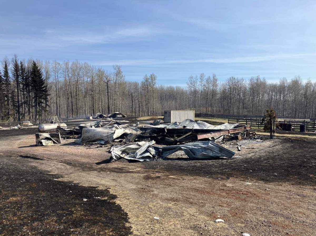 Jardine family farm in Entwistle, Alta., burned in wildfire on April 29, 2023.
