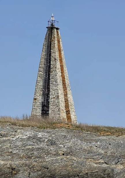 Little Mark Island and Monument stands between Broad Sound and Casco Bay, May 11, 2023, off the coast off Harpswell, Maine.