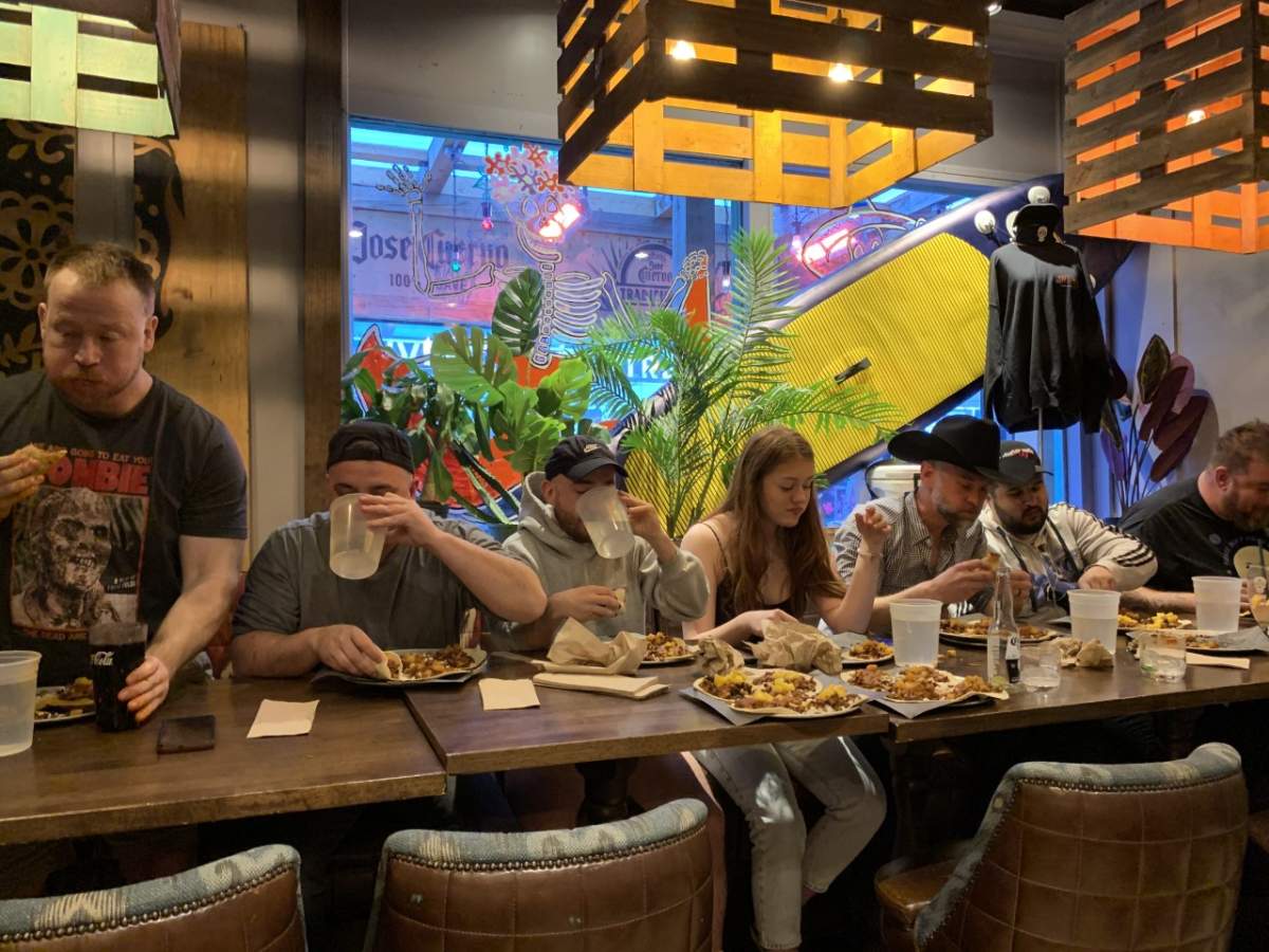 Contestants compete to see who can eat the most tacos in 10 minutes. LeBlanc stood for the entirety of the event.