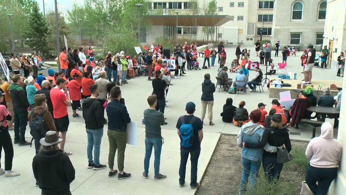 People gather to support Pacey Dumas, a man who was kicked in the head by an Edmonton police officer and was left with serious injuries.