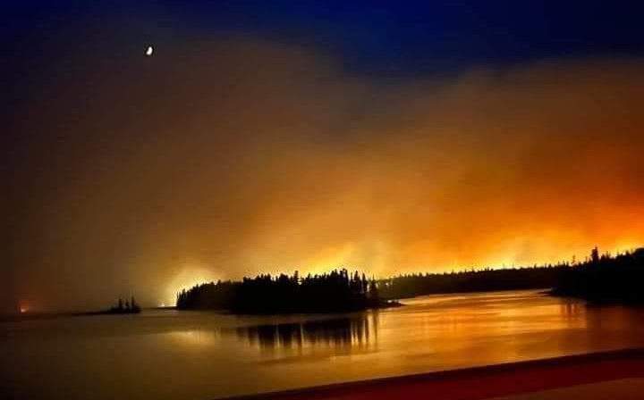 A wildfire rages near Cross Lake, Man.