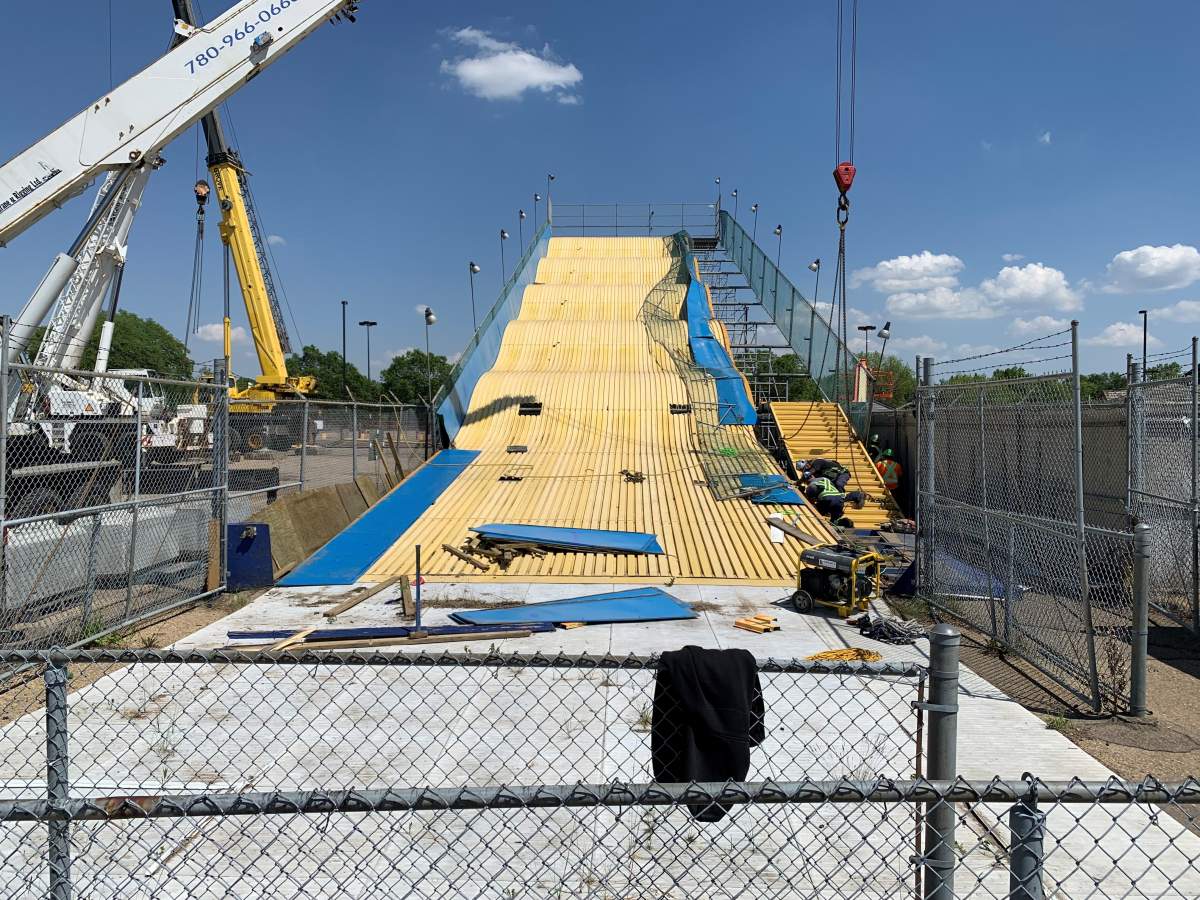 The Edmonton Expo slide being taken down on June 7, 2023.