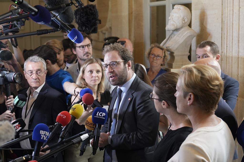 Antoine Armand, center, deputy for the Savoie region, in the French Alps, speaks at the National Assembly, Thursday, June 8, 2023 in Paris.