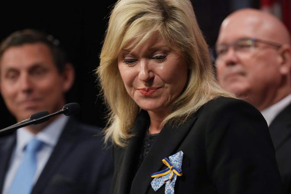 Mississauga Mayor Bonnie Crombie (centre), Brampton Mayor Patrick Brown (left), and Steve Clark, Ontario's Minister of Municipal Affairs and Housing attend a news conference at the Ontario legislature in Toronto on Thursday, May 18, 2023. Crombie has launched a bid to become leader of the Ontario Liberals, saying she wants to renew, rebuild and re-energize the party. 