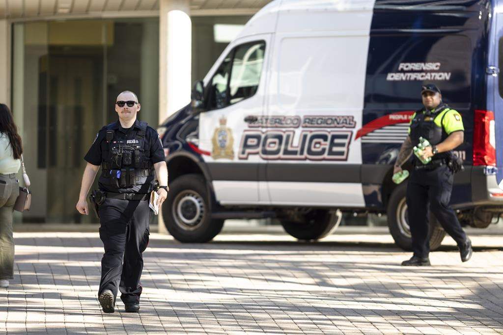 Members of Waterloo Regional Police investigate a stabbing at the University of Waterloo on Wednesday. Police said three victims were stabbed inside the university’s Hagey Hall, with one person taken into custody.