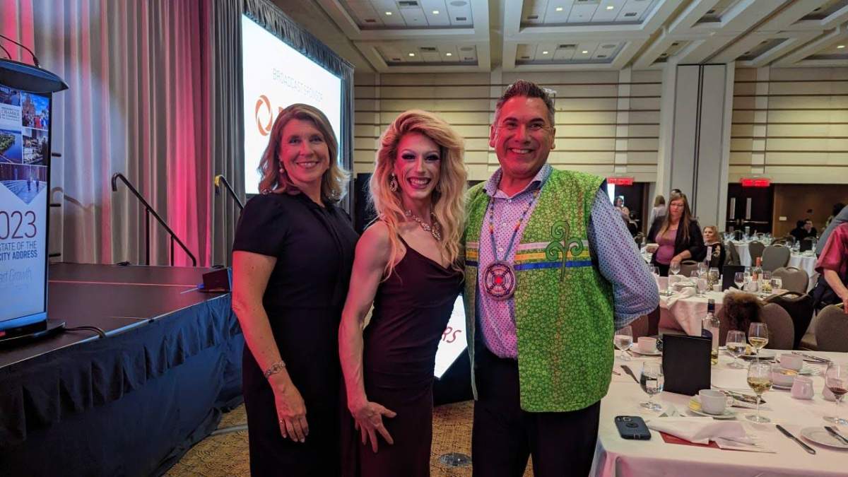 Fredericton Mayor Kate Rogers, Amour Love, and Chief Allan Polchies pose for a picture following the annual state of the city address. (Amour Love / Submitted)