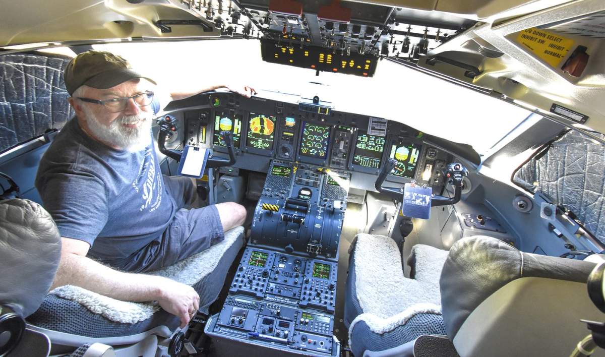 Conair Capt. Rich Tolson at the controls of one of two Dash 8-400 air tankers currently stationed at the BC Wildfire Service base at the Penticton Regional Airport.